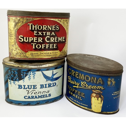 34 - TOFFEE TINS TRIO. Largest 6.25 x 9ins. Thornes, Cremona & Blue Bird. Double sided. Surface scratches... 