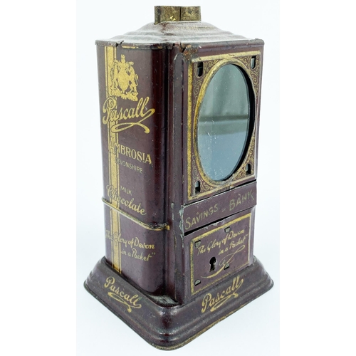 43 - PASCALLS AMBROSIA MILK CHOCOLATE TIN. 6ins tall. In the form of a savings bank with front opening do... 