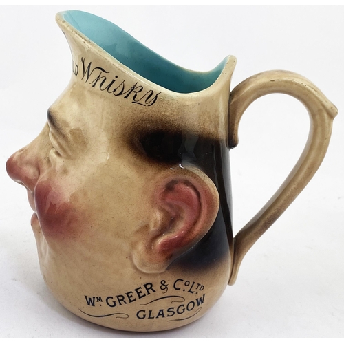 66 - GLASGOW GREER & CO OVH 10 YR OLD WHISKY SARREGUEMINES HEAD SHAPED PUB JUG. 5.9ins tall. Naturalistic... 