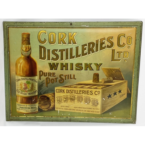 68 - CORK DISTILLERIES WHISKY PRESSED TIN SIGN. 1§6.9 x 20.9ins. Multicoloured image of labelled bottle a... 