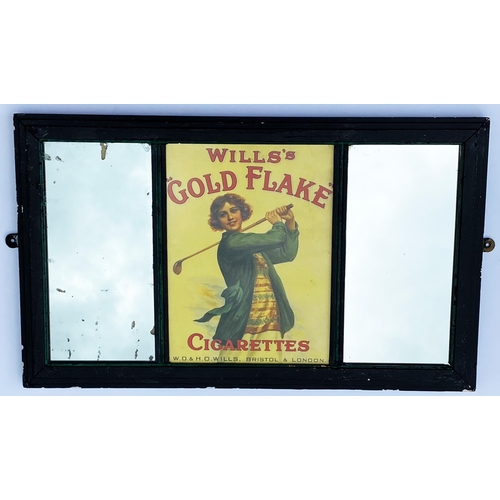 72 - WILLS GOLD FLAKE CIGARETTES FRAMED MIRROR. 14.5 x 24.5ins. Heavy black painted wooden frame with cen... 