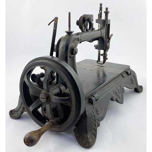 101 - JONES HAND MACHINE CAST IRON SEWING MACHINE. 10.25ins tall. Superb heavy Victorian cast iron machine... 