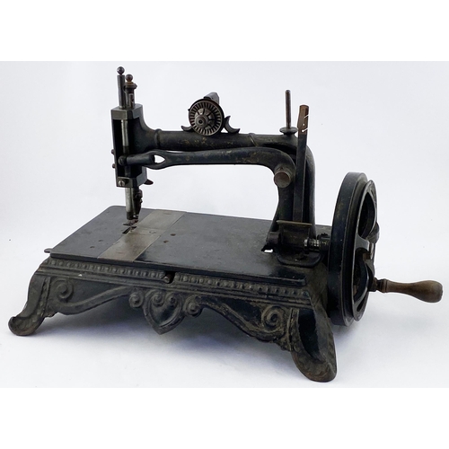 101 - JONES HAND MACHINE CAST IRON SEWING MACHINE. 10.25ins tall. Superb heavy Victorian cast iron machine... 