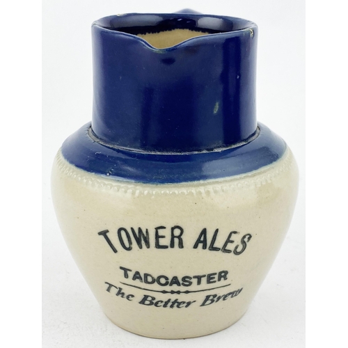 103 - TOWER ALES TADCASTER WATER JUG. 4.1ins tall.Deep blue top stoneware jug,transfer below lip. Three ti... 