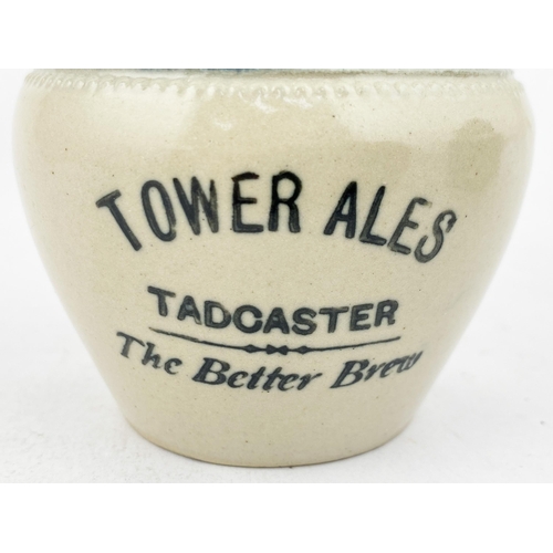 103 - TOWER ALES TADCASTER WATER JUG. 4.1ins tall.Deep blue top stoneware jug,transfer below lip. Three ti... 