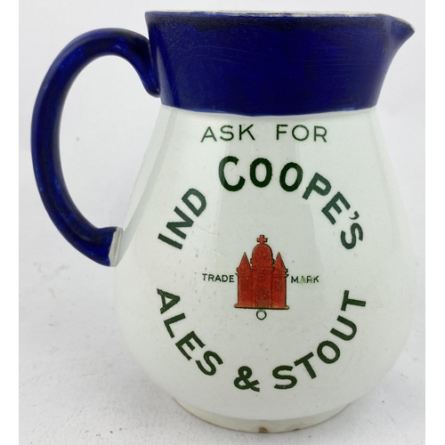 115 - IND COOPES ALES & STOUT WATER JUG. Blue top & handle, transfer both sides featuring red building (on... 