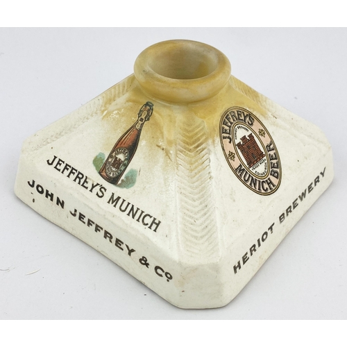 154 - EDINBURGH JOHN JEFFREY HERIOT BREWERY MATCH HOLDER/ STRIKER. 5ins square pyramid style featuring two... 