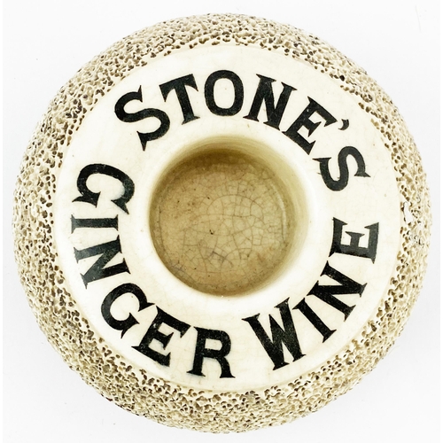 155 - STONES GINGER WINE STRIKER/ MATCH HOLDER. 3.8ins circular tyre type. Raised top section carrying the... 