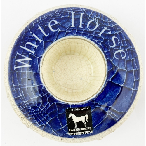 157 - WHITE HORSE WHISKY STRIKER/ MATCH HOLDER/ & HORSESHOE ASHTRAY DUO. Circular 4.5ins diam. Familiar bl... 