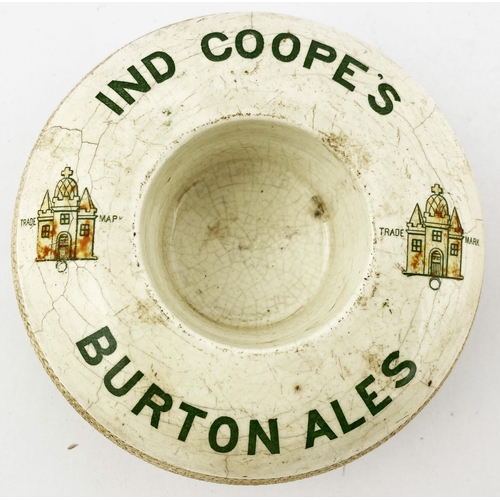 158 - ND COOPE BURTON ALES MATCH HOLDER/ STRIKER. 4.6ins diam. Heavy tyre type with green & orange (faded)... 