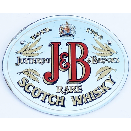 135 - J & B SCOTCH WHISKY MIRROR. 15.5 x 12.5ins oval. Large red letters to centre surrounded by gold & co... 