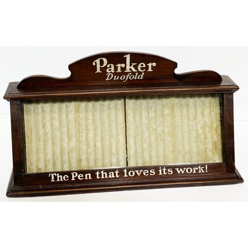 90 - PARKER DUOFOLD PEN DISPLAY CABINET 20ins wide,6.75ins deep, 11.2ins tall. Dark wooden box, shaped na... 