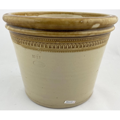 12 - DUNDEE BUTTER CROCK. 7.25ins tall. Tan rim, wheeled decoration to bottom & top edge. Blue impressed ... 