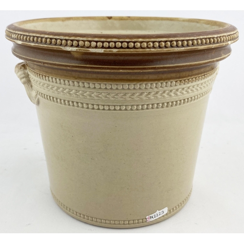 14 - NEWPORT - FIFE BUTTER CROCK. 7.25ins tall. Tan rim, wheeled decoration to bottom & top edge, two sid... 