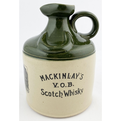 53 - LEITH WHISKY JUG. WG p119, B361. 5.75ins tall. Deep green top, black transfer, rear handle. CHARLES ... 