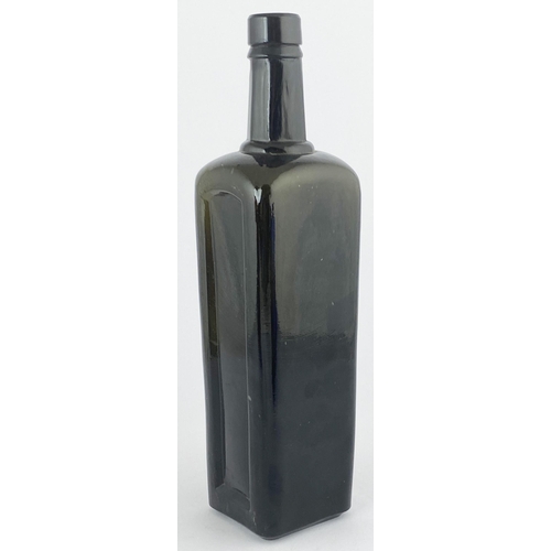 86 - HANDYSIDES CONSUMPTION CURE BOTTLE. 11.75ins tall. Very dark black glass. Three indented panels one ... 