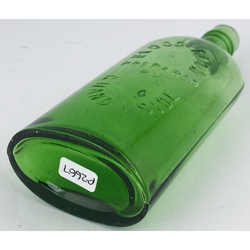 88 - G. HANDYSIDES BLOOD FOOD BOTTLE. 7.25ins tall. Very bright mid green glass. Long neck, sloping shoul... 