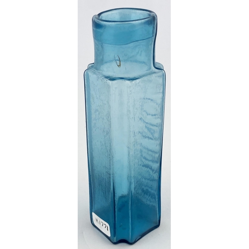 91 - LONDON MUSTARD BOTTLE. 5.25ins tall. Light turquoise/ blue glass, square bodied, curved inward facet... 