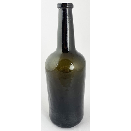 97 - CORNISH SEALED CYLINDER WINE BOTTLE. 10.6ins tall. Heavy, crude, black glass cyliner, wonderful hand... 