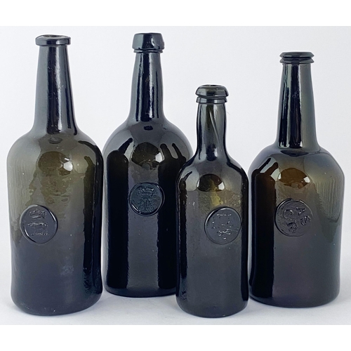 97 - CORNISH SEALED CYLINDER WINE BOTTLE. 10.6ins tall. Heavy, crude, black glass cyliner, wonderful hand... 