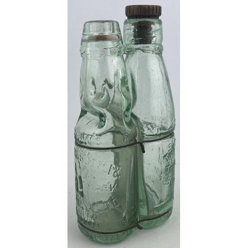 118 - SCHONS TWIN BOTTLE PATENT. 7.25ins tall. Two aqua glass mineral type bottles wired together one a Ni... 