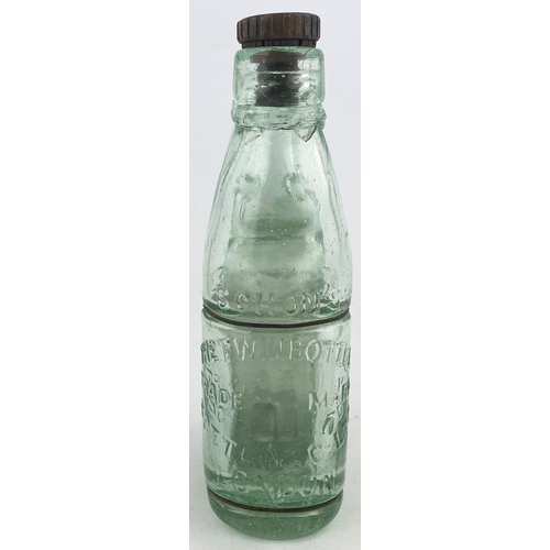 118 - SCHONS TWIN BOTTLE PATENT. 7.25ins tall. Two aqua glass mineral type bottles wired together one a Ni... 