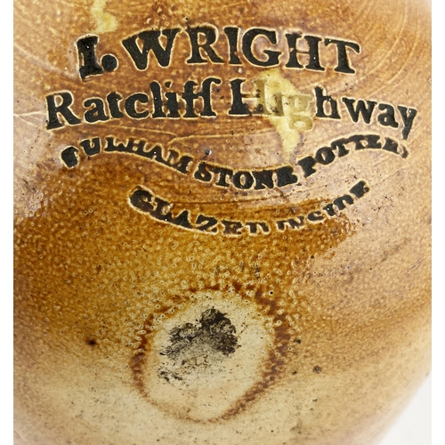 126 - RATCLIFF HIGHWAY IMPRESSED FLAGON. 9.25ins tall. Slightly t.t. salt glaze, rear handle. Impressed I.... 