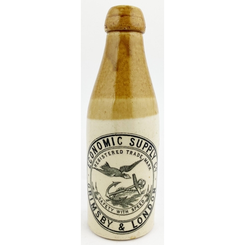 140 - GRIMSBY & LONDON GINGER BEER BOTTLE. 8ins tall, ch., t.t., crisp black transfer. ECONOMIC SUPPLY CO.... 