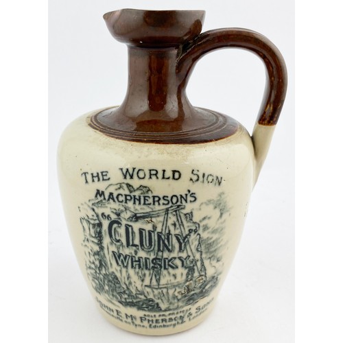 56 - MACPHERSONS WHISKY JUG. WG p128, B394. 7ins tall. Dark brown neck, black transfer,side handle. THE W... 