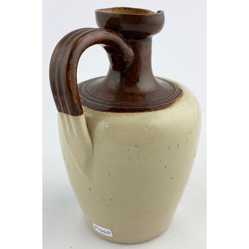 56 - MACPHERSONS WHISKY JUG. WG p128, B394. 7ins tall. Dark brown neck, black transfer,side handle. THE W... 