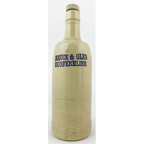 80 - DUNFERMLINE BRUCE & GLENN AMMONIA BOTTLE. DP p129. 11ins tall, off white/ cream upper, lower glazed ... 