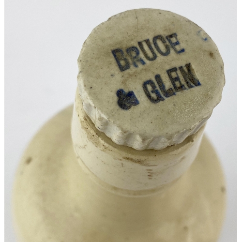 80 - DUNFERMLINE BRUCE & GLENN AMMONIA BOTTLE. DP p129. 11ins tall, off white/ cream upper, lower glazed ... 