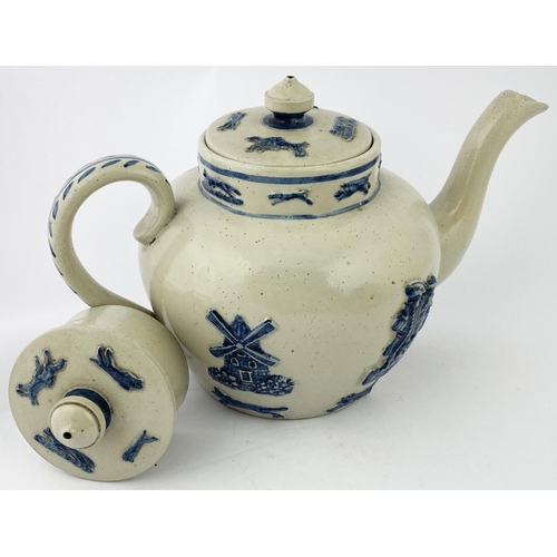 82 - DENBY PERSONALISED DATED TEAPOT. 7.2ins tall. Cream/ grey body, striking detailed applied blue sprig... 