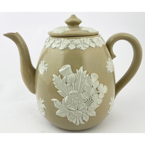 83 - DENBY PERSONALISED CORONATION DATED TEAPOT. 6.7ins tall. Cream body with detailed applied sprigs, li... 