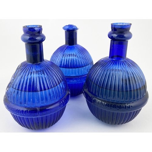 87 - HARDENS STAR FIRE GRENADE TRIO. 6.8ins tall. Classic cobalt blue liquid filled grenades (not suitabl... 