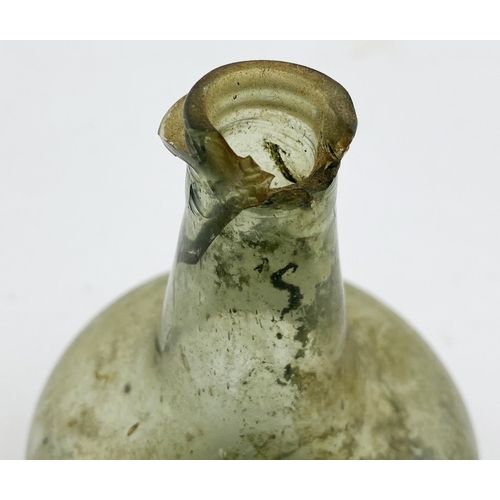 132 - MINIATURE SHAFT & GLOBE BOTTLE. 3ins tall. A mini shaft & globe form in a quite pale green tinged gl... 