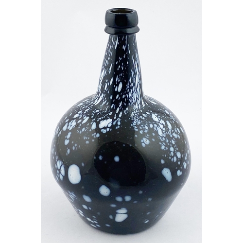 136 - NAILSEA GLOBULAR WINE BOTTLE. 9ins tall. Deep black glass Nailsea/ Alloa style form, numerous white ... 