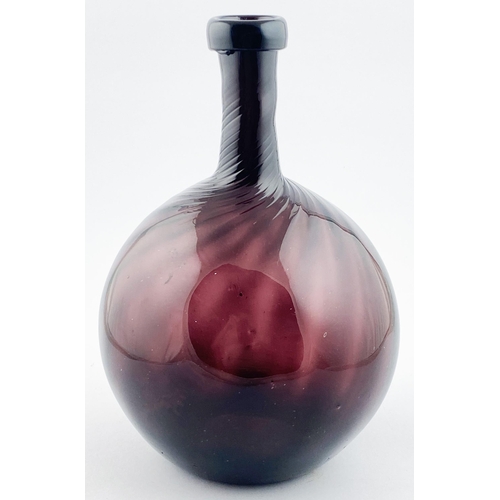 138 - AMETHYST TWISTED NECK BOTTLE. 11.8ins tall, vivid, strong amethyst form. Stunning spherical bodied f... 