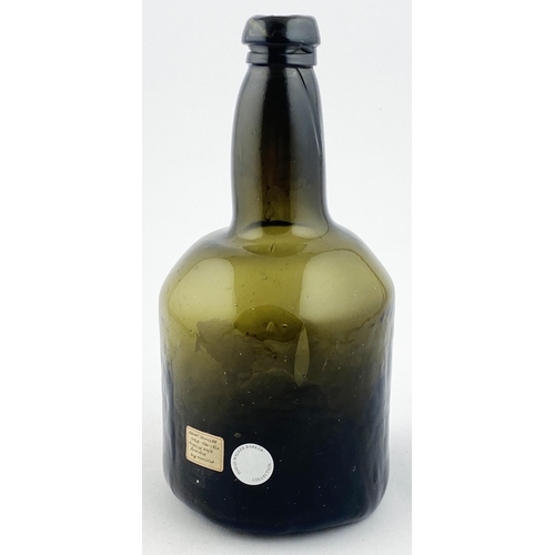 139 - ENGLISH STUMPY CYLINDER WINE BOTTLE FORM. 8.9ins tall. Dark green/ black glass, heavy & crude. Neck ... 