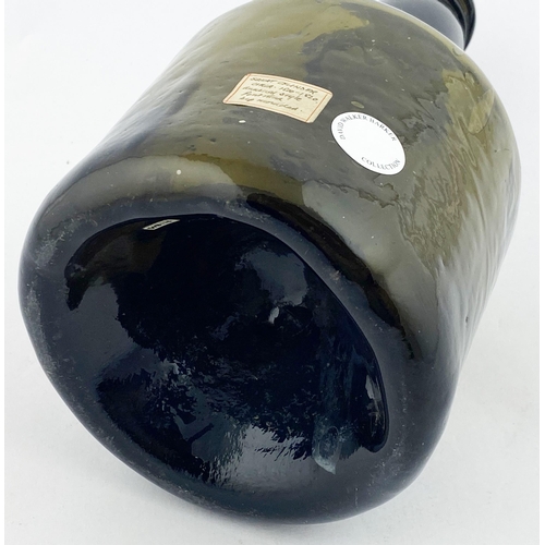 139 - ENGLISH STUMPY CYLINDER WINE BOTTLE FORM. 8.9ins tall. Dark green/ black glass, heavy & crude. Neck ... 