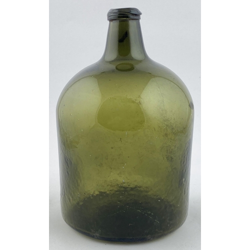 140 - ENGLISH WIDE BODIED BOTTLE. 9.4ins tall. Wide body shape with short squat neck, & chunky lip. Base p... 