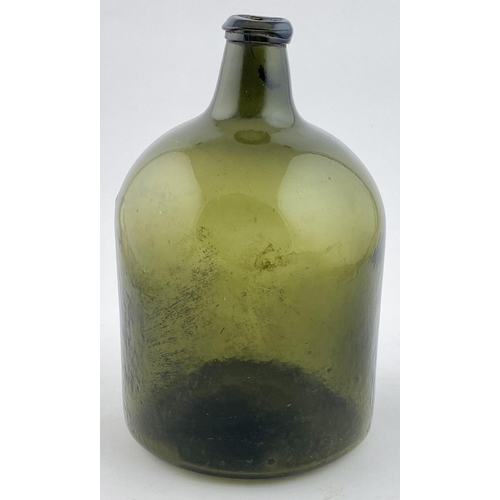 140 - ENGLISH WIDE BODIED BOTTLE. 9.4ins tall. Wide body shape with short squat neck, & chunky lip. Base p... 