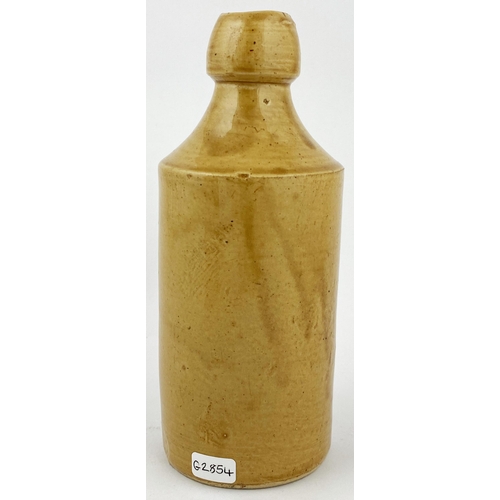 145 - LONDON G WILSON & CO GINGER BEER BOTTLE. 6.6ins tall, std, all tan. Andy Richmond found the pictoria... 