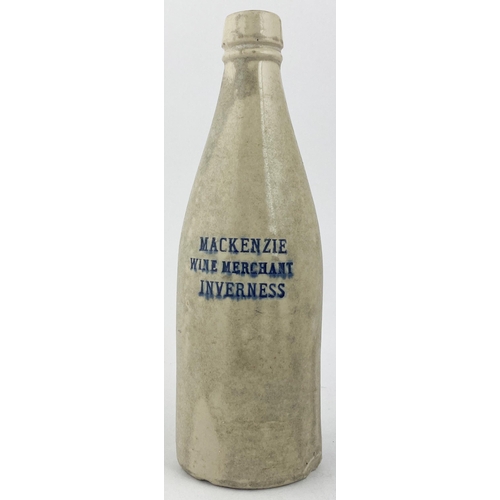 153 - INVERNESS MACKENZIE GINGER BEER BOTTLE. 8.6ins tall, ch., all white , square shaped lip. Three impre... 