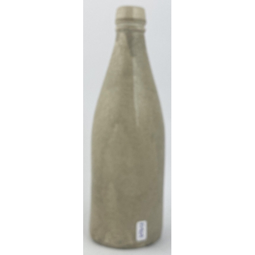 153 - INVERNESS MACKENZIE GINGER BEER BOTTLE. 8.6ins tall, ch., all white , square shaped lip. Three impre... 