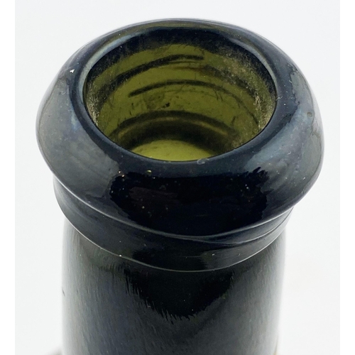 209 - ENGLISH SPLIT SIZE SEALED CYLINDER WINE BOTTLE. 8.7ins tall. Deep olive green/ black glass, rounded ... 