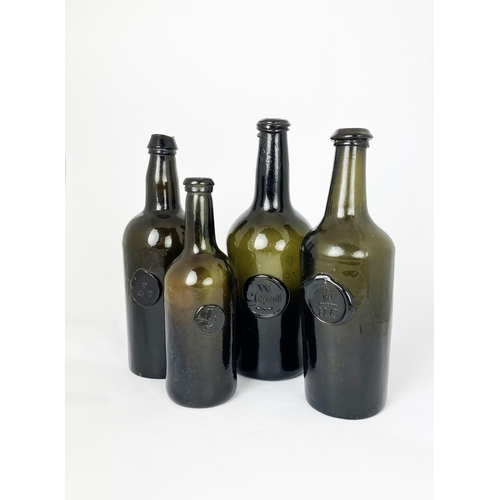 209 - ENGLISH SPLIT SIZE SEALED CYLINDER WINE BOTTLE. 8.7ins tall. Deep olive green/ black glass, rounded ... 