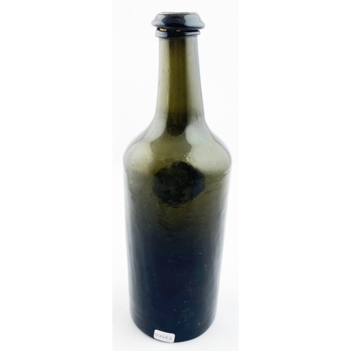 211 - ENGLISH SPLIT SIZE SEALED CYLINDER WINE BOTTLE. 10.4ins tall. Deep olive green/ black glass, rounded... 