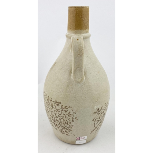 216 - CREAM OF IRISH WHISKY SHAMROCK WHISKY JUG. WG p168. 8.7ins tall. Elongated pear shape, rear handle. ... 