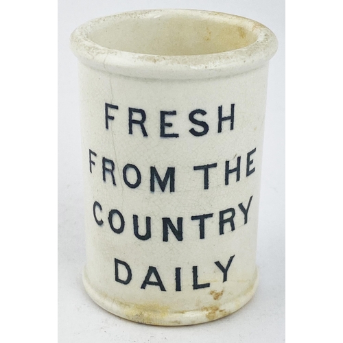14 - BLACKMOOR VALE CLOTTED CREAM POT. 3.1ins tall. All white body, strong black transfer both front & ba... 